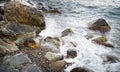 Stones with water and spray, splash. Sea coast Royalty Free Stock Photo