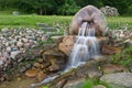 Stones and waterfall of Lielbata spring drinking water