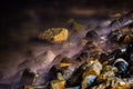 Stones On The Wavy Dreamy Soft Seashore Royalty Free Stock Photo