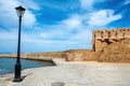 Stonewall breakwater at Venetian port, Chania Old Town Crete, Greece. Ruins of ancient building Royalty Free Stock Photo