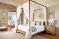 stonewalled bedroom with canopy bed