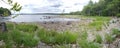 Stoney beach with trees at Kejimkujik