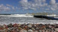 Stony beach of the Baltic Sea with strong waves and blue sky3