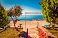 Stony beach and beautifull view to ancient fortress on the Alanya peninsula Turkey. Toned Royalty Free Stock Photo