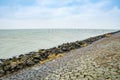 Stony embankment by the coast of Markermeer near Almere in Netherlands