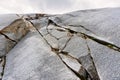 Stony embossed rocks of the Rhone Glacier at Furka Pass, Valais, Switzerland. Royalty Free Stock Photo