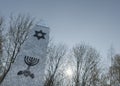 Stony monument with jewish star and candlestick, Poland