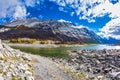 Stony shore of Medicine Lake Royalty Free Stock Photo