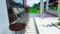 Stool and chairs on the porch in front of the glass wall Royalty Free Stock Photo