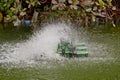 Stop action of water and aerator turbine in pool Royalty Free Stock Photo