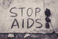 Stop Aids text hand write by black chacoal Royalty Free Stock Photo