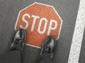 Stop sign on the road Royalty Free Stock Photo