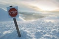 Stop. Avalanche sign in front of winter snowy mountains. r Royalty Free Stock Photo