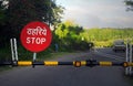 Stop barricade on railroad crossing, India