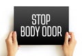 Stop Body Odor text on card, concept background