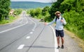 Stop car. Man try stop car thumb up. Hitchhiking one of cheapest ways traveling. Picking up hitchhikers. Hitchhikers Royalty Free Stock Photo