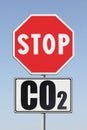 Stop Co2 written on roadsign - concept image on blue background Royalty Free Stock Photo