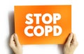 Stop COPD text on card, medical concept background