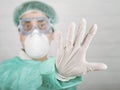 Stop coronavirus.Medical worker doctor showing a stop sign, background blur Royalty Free Stock Photo
