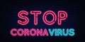 Stop Coronavirus neon sign quarantine coronavirus epidemic. Bright night neon sign against the background of a brick