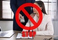 Stop corruption. Illustration of red prohibition sign and man giving bribe to woman at table in office Royalty Free Stock Photo