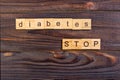 stop diabetes text word made with wood blocks. Concept Diabetes Prevention