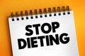 Stop Dieting text on notepad, concept background Royalty Free Stock Photo