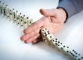 Stop Domino Effect - Hand Prevents Royalty Free Stock Photo