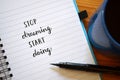 STOP DREAMING START DOING hand-lettered in notebook Royalty Free Stock Photo