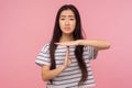 Stop, enough, I need break. Portrait of exhausted girl with long hair in t-shirt showing time-out gesture and looking imploringly