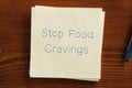 Stop Food Cravings on a note Royalty Free Stock Photo