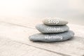 Stop Global Warming words written on stones. Environmental protection concept Royalty Free Stock Photo