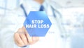 Stop Hair Loss , Doctor working on holographic interface, Motion Graphics Royalty Free Stock Photo