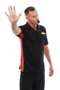 Stop, hand and portrait of man referee blowing whistle for studio warning, penalty or gesture on white background Royalty Free Stock Photo