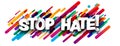 Stop hate sign over colorful brush strokes background