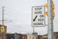 Stop here on red signal sign Royalty Free Stock Photo