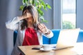 Stop, I don`t want to see you. Portrait of shy or scared young woman in glasses sitting, covered her eyes with hands and don`t Royalty Free Stock Photo