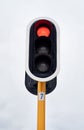 Stop. Lights, stop and grey sky in urban area for speed control, safety and robot in the city. Traffic, metal and red Royalty Free Stock Photo