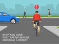 Stop and look before entering a street. Back view of a cyclist on residential area road.