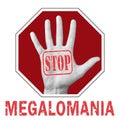 Stop megalomania conceptual illustration. Open hand with the text stop megalomania Royalty Free Stock Photo
