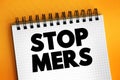 Stop Mers text on notepad, health concept background