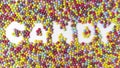 Stop motion animation of Multicolored dragee make text Candy.