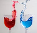 Abstract of water splash forming two dancers in the wine glasses. Royalty Free Stock Photo