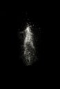 Stop motion of white dust explosion isolated on black background Royalty Free Stock Photo