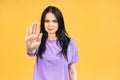 Stop or no sign! Young beautiful hispanic sad woman serious and concerned looking worried and thoughtful facial expression feeling Royalty Free Stock Photo