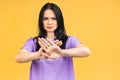 Stop or no sign! Young beautiful hispanic sad woman serious and concerned looking worried and thoughtful facial expression feeling Royalty Free Stock Photo