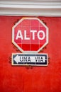 Stop and one way signs in spanish alto una via