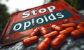 Stop Opioids Sign and Spilled Prescription Pills, Urgent Public Health Message on Drug Addiction and Painkiller Abuse Awareness