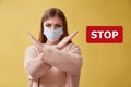 Stop pandemia. No coronavirus. Coronavirus outbreak. Viral infection. Stop inscription. Seasonal viruses. Woman in mask