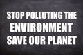 Stop polluting the environment save our planet quotes and slogans with blackboard background for world environment day.